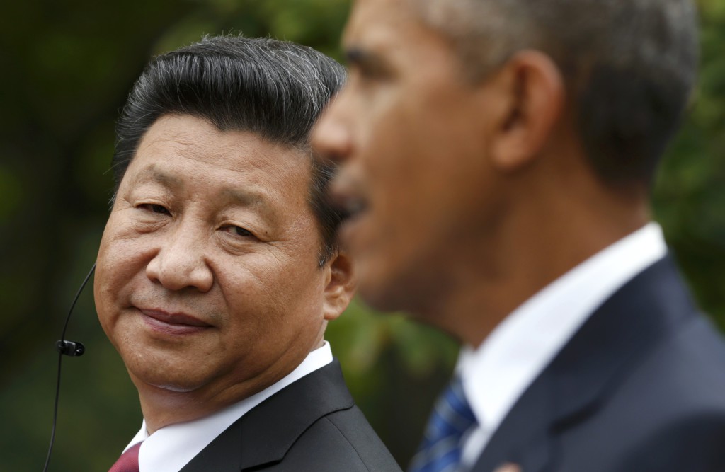 El presidente de China, Xi Jinping, y el presidente de EE.UU., Barack Obama, en Washington, setiembre 2015.