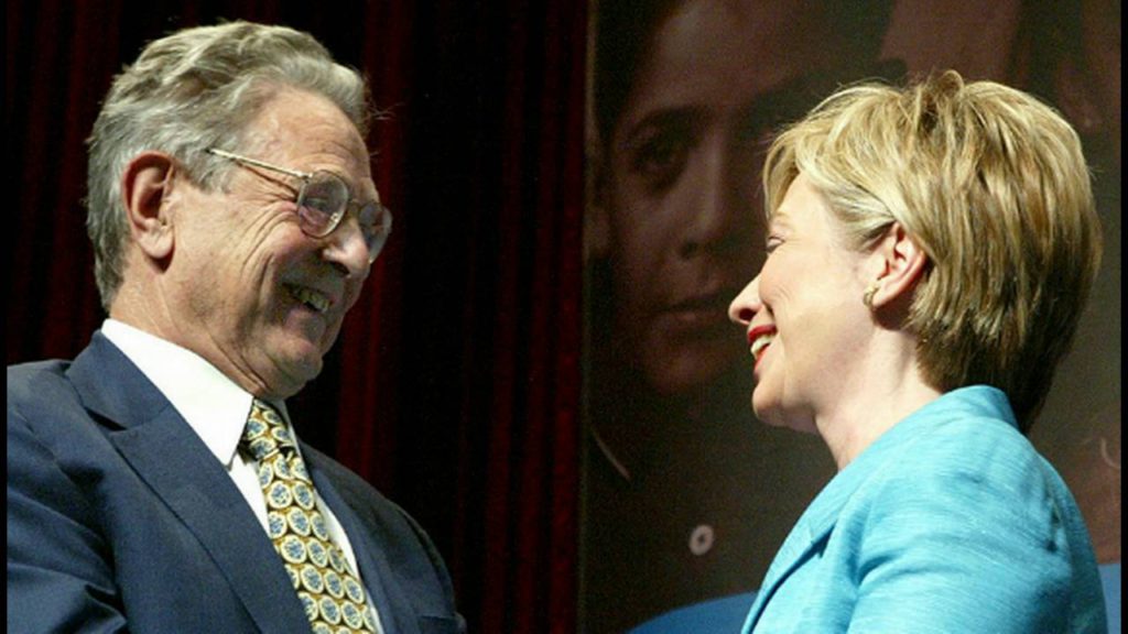 Hillary Clinton con el especulador G. Soros